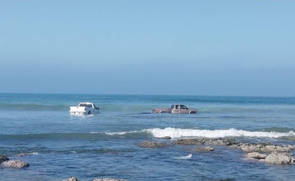 Four Trucks Pulled from the Sands of Rosarito